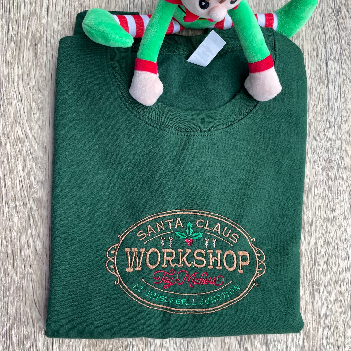 Santa Claus Workshop Embroidered Sweatshirt