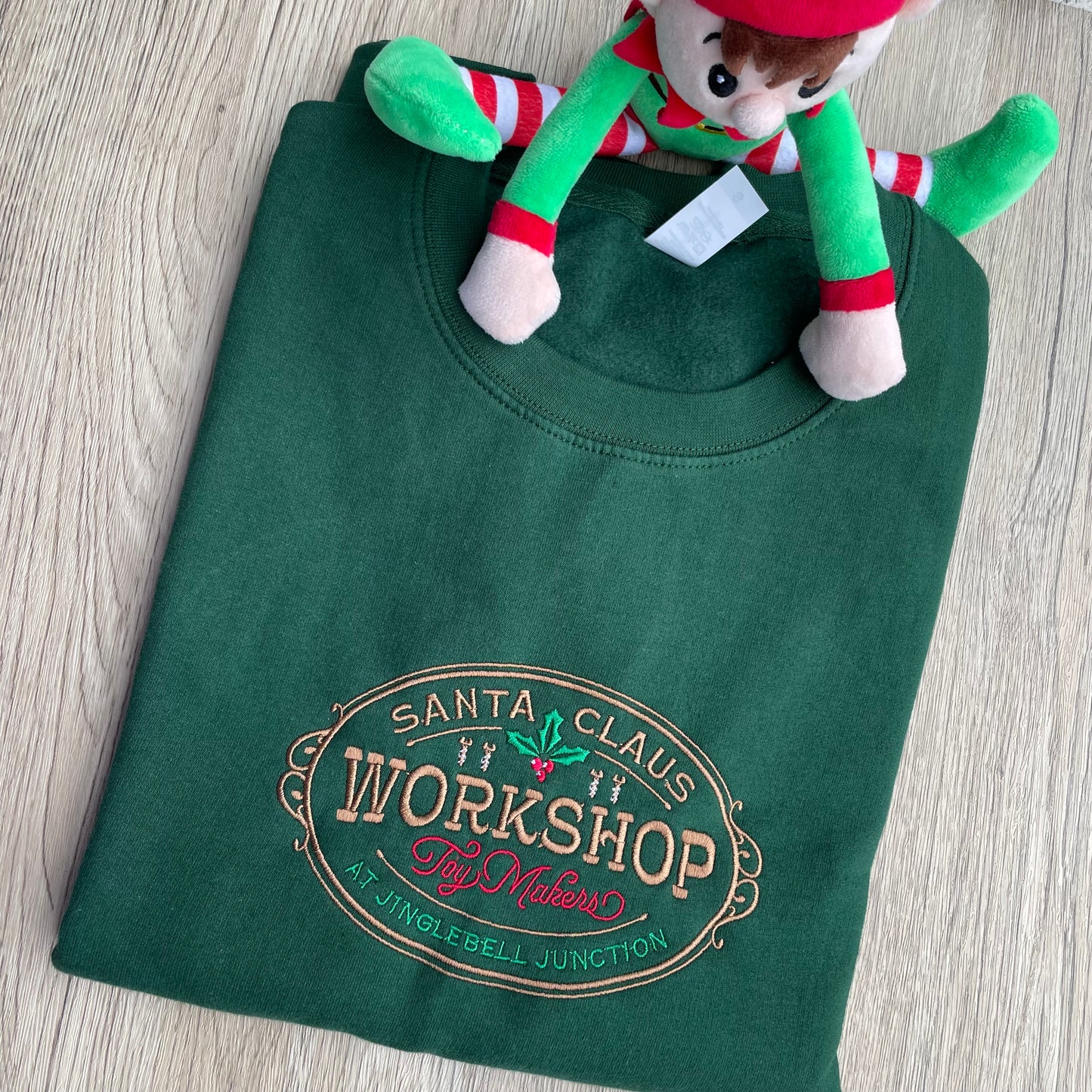Santa Claus Workshop Embroidered Sweatshirt
