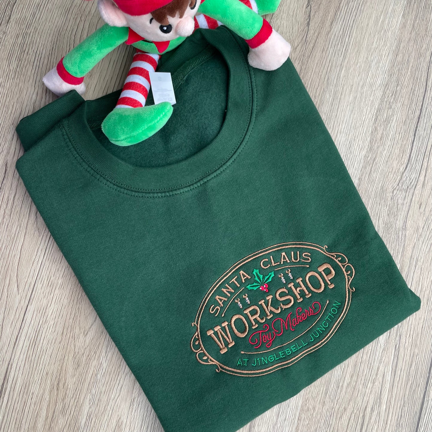 Santa Claus Workshop Embroidered Sweatshirt